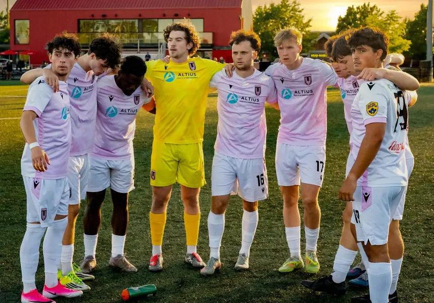 Soccer club gathered together for a team photograph